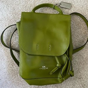 Green leather mini backpack by Coach